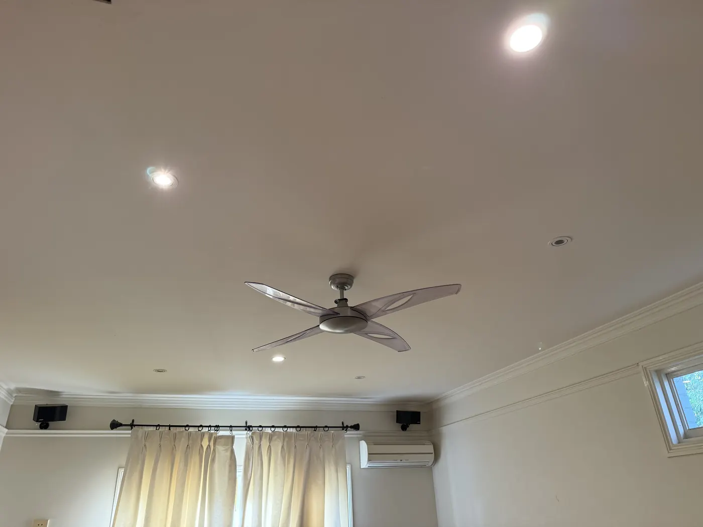 Ceiling fan with an integrated light in a living area