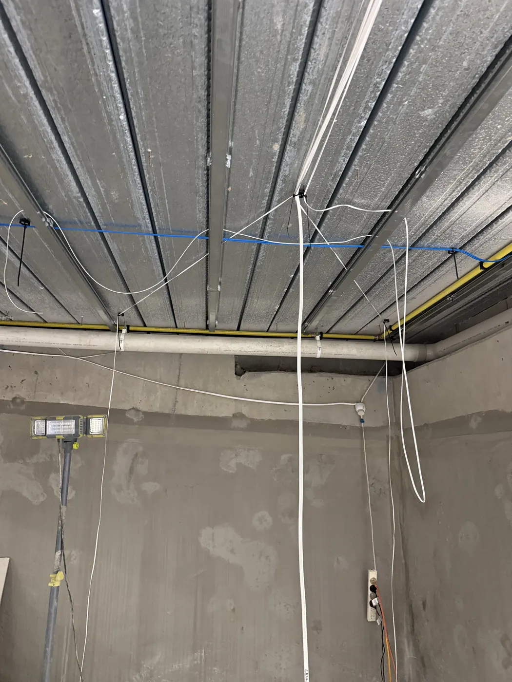 Electrical conduit run across a ceiling